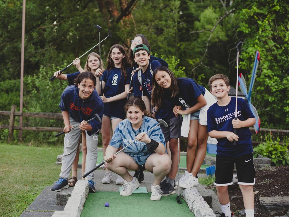 Campers learn teamwork playing mini-golf championships!